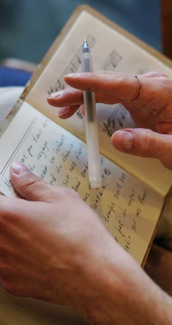 A person writing poetry